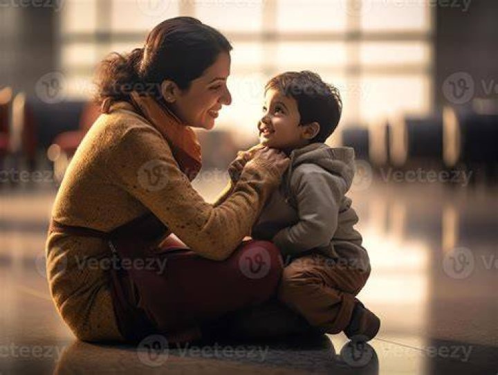 Captivating son holding his mom head no blur picture