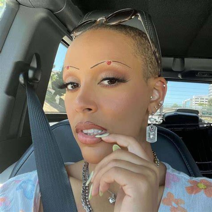 Doja Cat slams critics of her shaved head 'Go f&mdash;k yourselves'