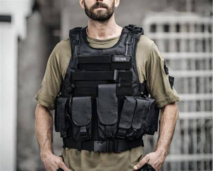 Palmeter, wearing a tactical vest, shot and killed&nbsp;9-year-old Anolt Joseph "A.J." Laguerre Jr., and 29-year-old Jarrald De'Shawn Gallion inside the store