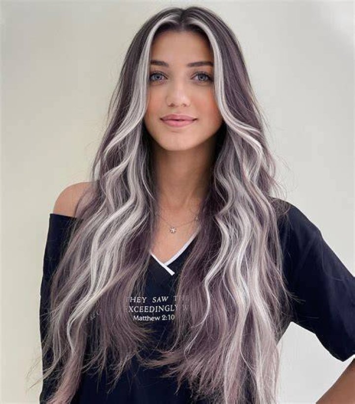 Silver money piece highlights on long black hair Black hair with